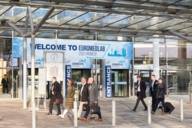 Visitors in front of the entrance area to Messe München