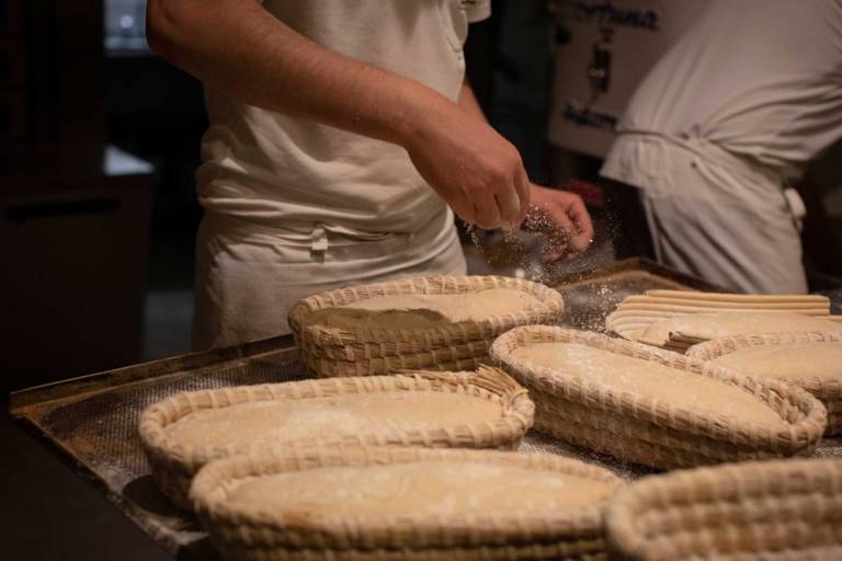 Baker at work in the Hofbräuhaus-Kunstmühle in Munich.