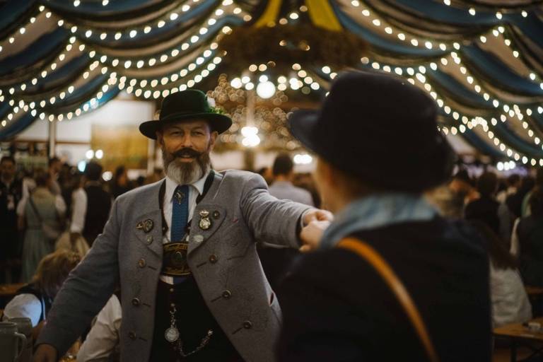 Dancing people at the Oktoberfest in Munich.