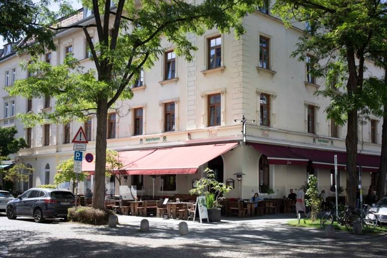 In an old building, there is a restaurant with terrace on the ground floor