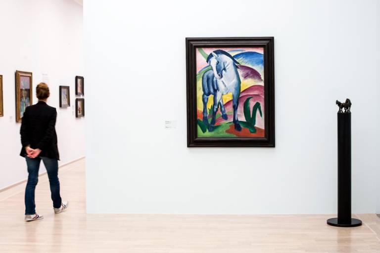 Blue Horse I by Franz Marc on display at the Lenbachhaus in Munich.