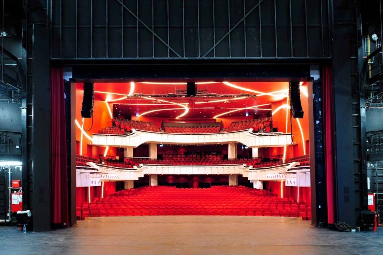 Stage and auditorium of the Deutsches Theater in Munich photographed from the rear area of the stage. 