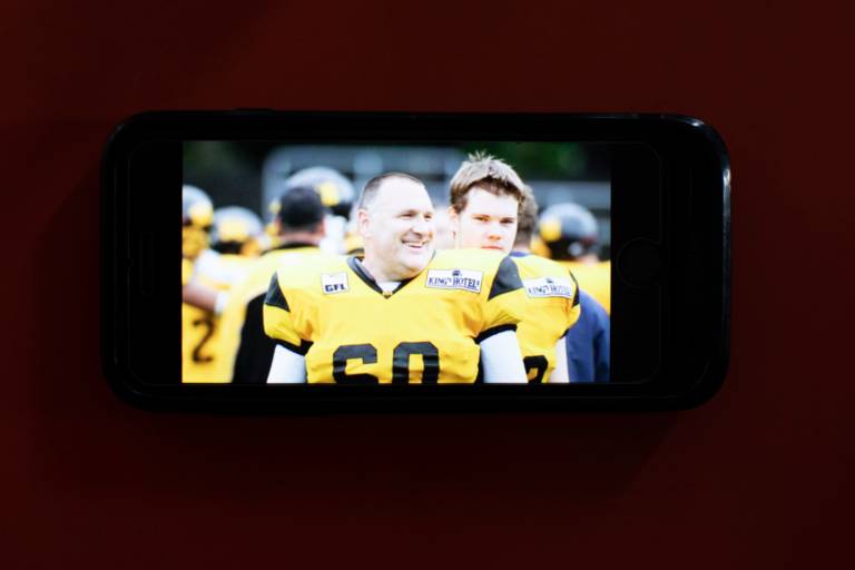 Photo of two American football players in jerseys