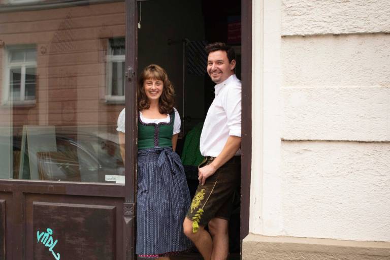 Employees of Munich Tourism in costume in the Bavarian Outfitters in Munich